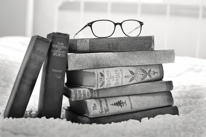Vintage Books Stack of vintage books with glasses