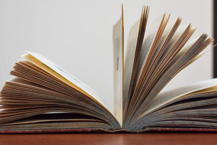 Historical book lying open Historical book lying open