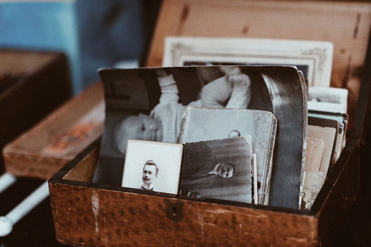box of old photos in need of preservation