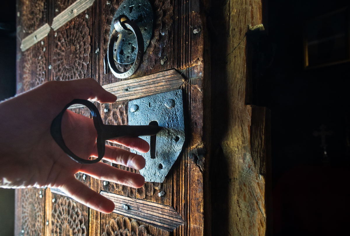 Key unlocking a door