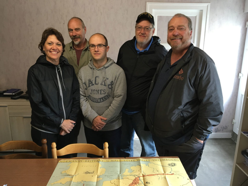 Antoine Noslier presents the Miller children with the map. Left to Right: Myra Miller, Del Miller, Antoine Noslier, Marshall Miller, Ken Miller. Image used with permission.